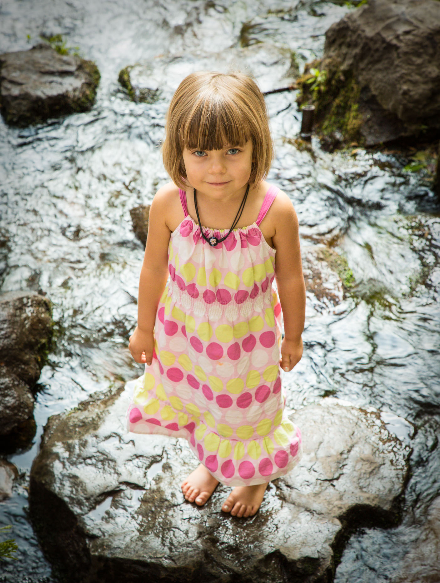 Portrait of girl standing in creek in Shasta City California, by David Zaitz