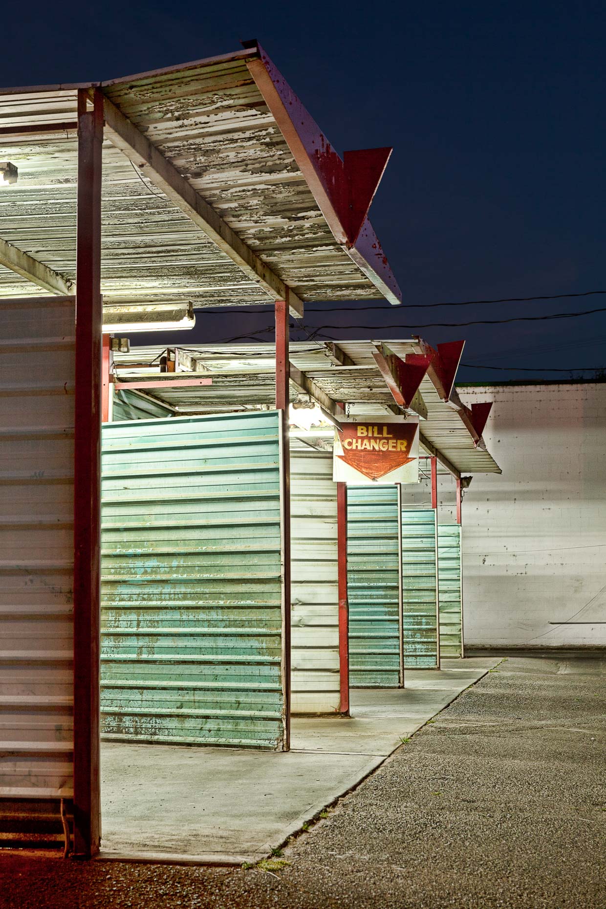 Coin operated car wash at night in Grants Pass, Oregon by David Zaitz