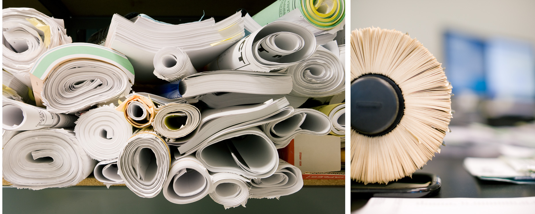 Rolls of blueprints and detail of Rolodex in office. David Zaitz Photography.