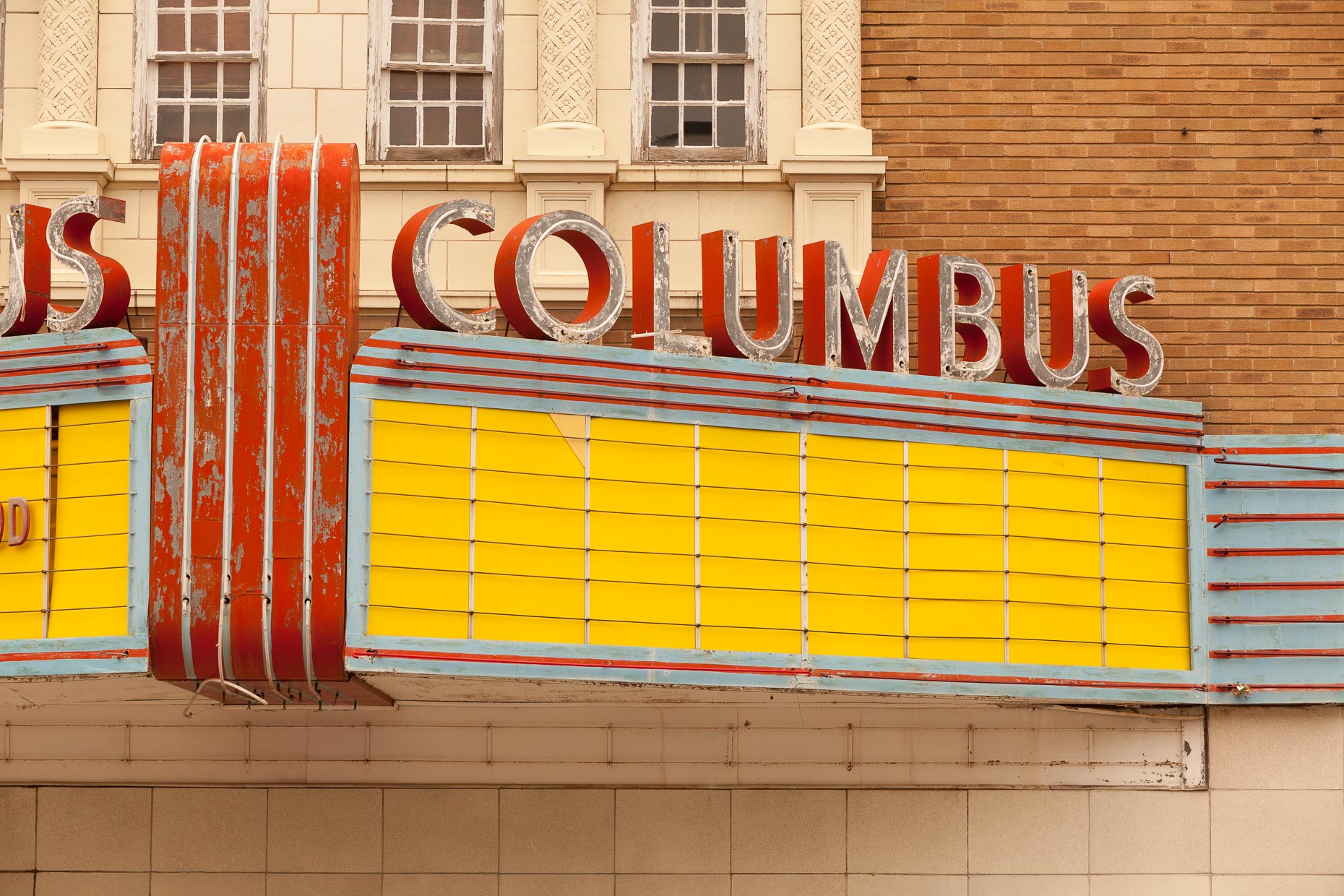 Movie theater marquee sign with neon COLUMBUS sign by David Zaitz.
