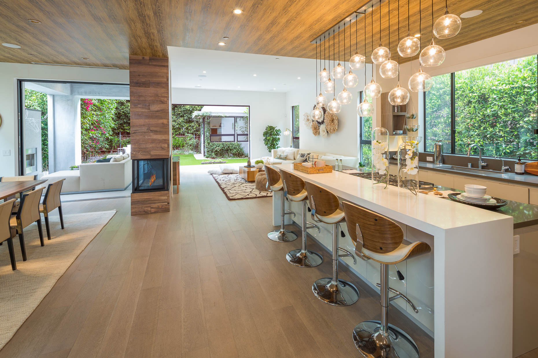 Architecture photograph of kitchen and great room in upscale residence in Los Angeles, California by David Zaitz