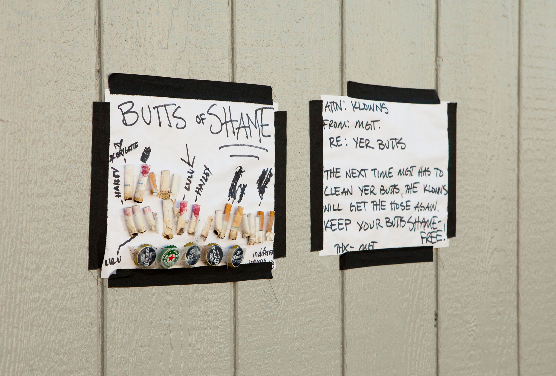 Sign notice about cigarette butts behind the scenes at Cirque Berzerk circus performers, by David Zaitz