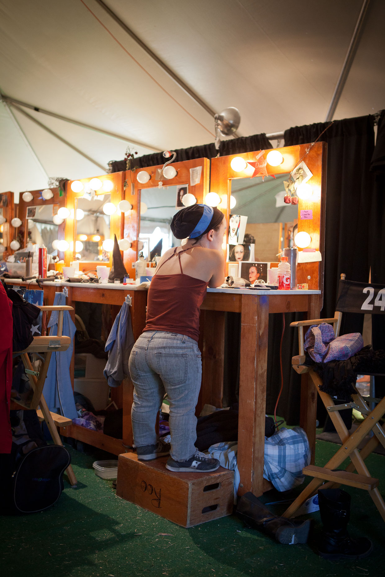 Little person applies makeup  at Cirque Berzerk circus performers, by David Zaitz