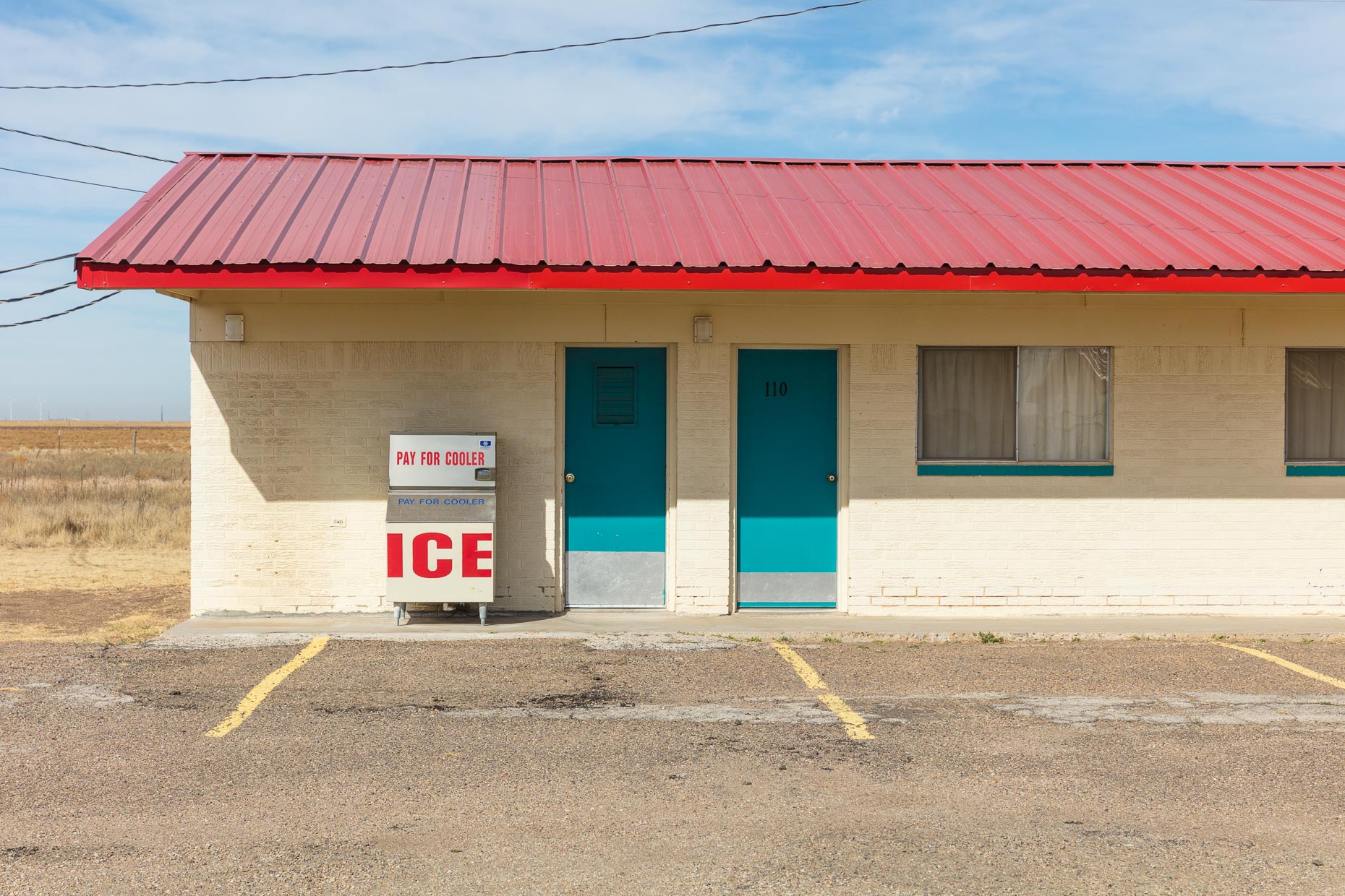 Ice machine in front of motel rooms along Route 66 in Conway, Texas