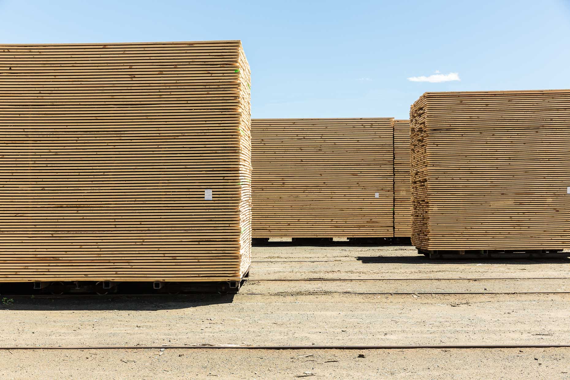 Stacks of finished lumber at lumber mill, Malheur Lumber Company mill ...